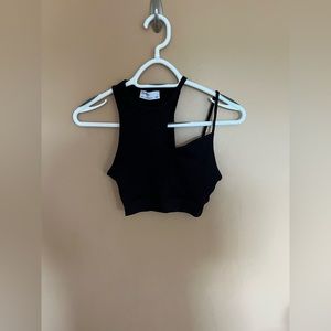 Size medium black Berksha crop top. Never worn.